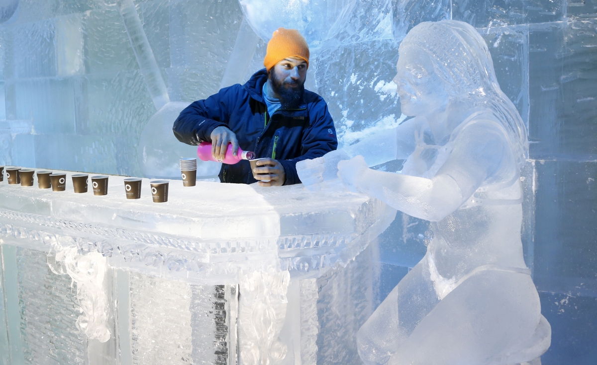 The Ice Maiden Cometh. Sculptor Jonathan Bouchard of Canada poses near a sculpture at the ice bar of the Brussels Ice Magic Festival. Some 20 artists from all over the world made sculptures out of 420 tonnes of ice depicting characters from comic strips. The Ice Maiden Cometh. Sculptor Jonathan Bouchard of Canada poses near a sculpture at the ice bar of the Brussels Ice Magic Festival. Some 20 artists from all over the world made sculptures out of 420 tonnes of ice depicting characters from comic strips.