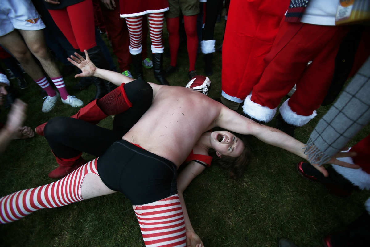 This Father Christmas has an unfair weight advantage at this impromptu Xmas wrestling match during the SantaCon event in San Francisco. This Father Christmas has an unfair weight advantage at this impromptu Xmas wrestling match during the SantaCon event in San Francisco.