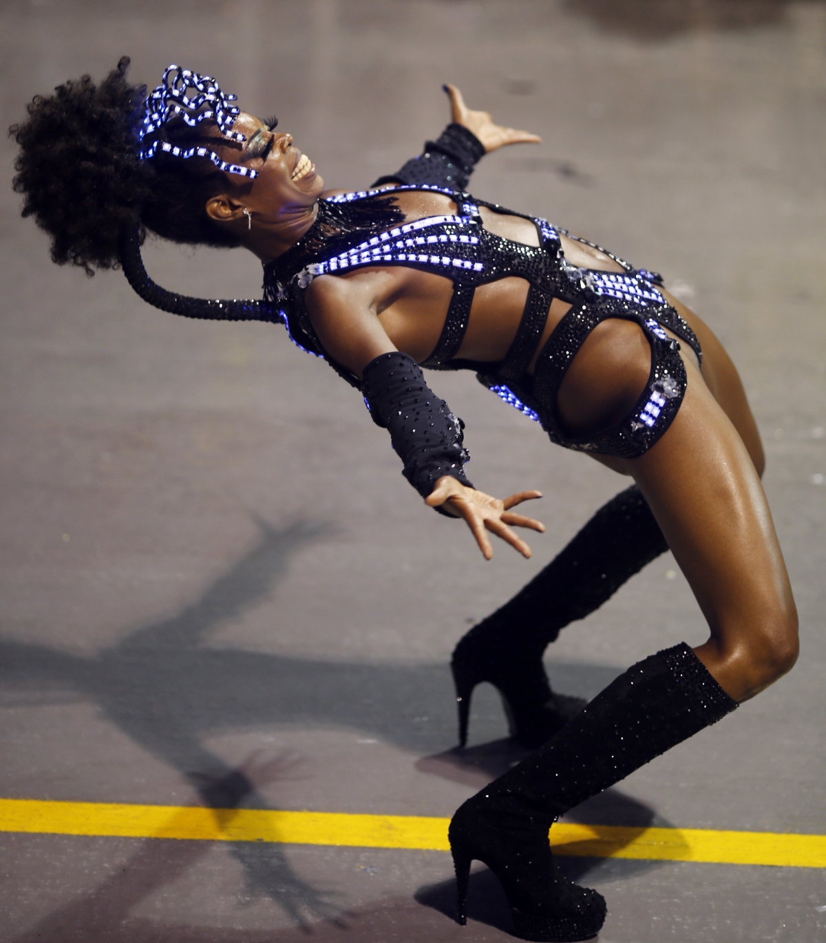 A reveller from the Vai Vai samba school takes part in the first night of the Special Group category of the annual Carnival parade in Sao Paulo's Sambadrome March 1, 2014. A reveller from the Vai Vai samba school takes part in the first night of the Special Group category of the annual Carnival parade in Sao Paulo's Sambadrome March 1, 2014.