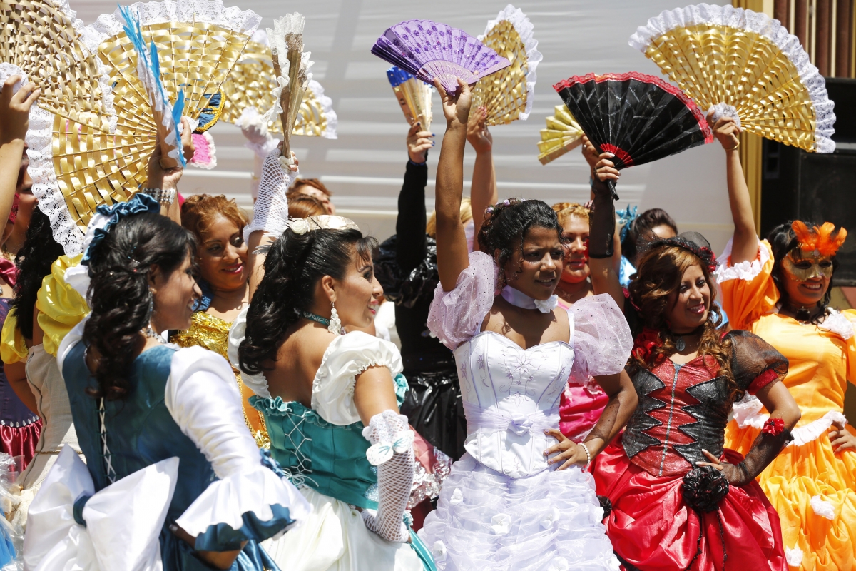 Inmates dance in an event ahead of the International Women's Day at Santa Monica female prison in Lima, Peru. The International Women's Day is on 8 March. International Women's Day 2014