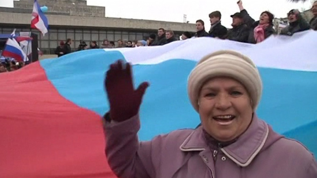Pro-Russia Crimeans Dance Around Giant Russian Flag