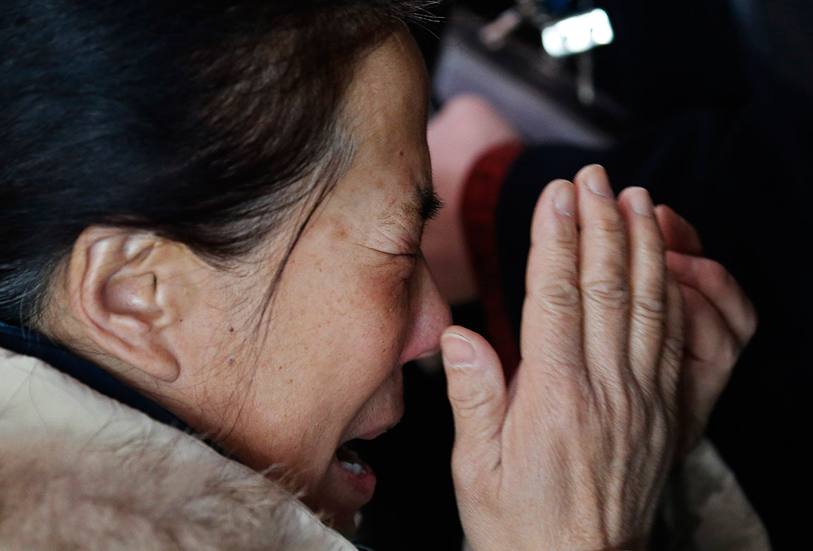 Image result for Families of Malaysian flight MH370 crying