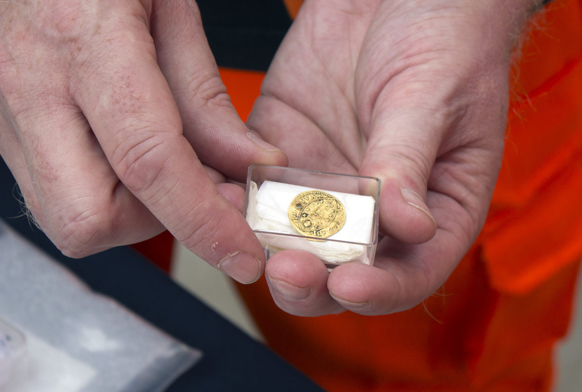 Crossrail discovered a solid gold coin from Venice at Liverpool Street, which had a hole where it had been sewn onto a coat to keep it safe Crossrail discovered a solid gold coin from Venice at the Liverpool Street construction site