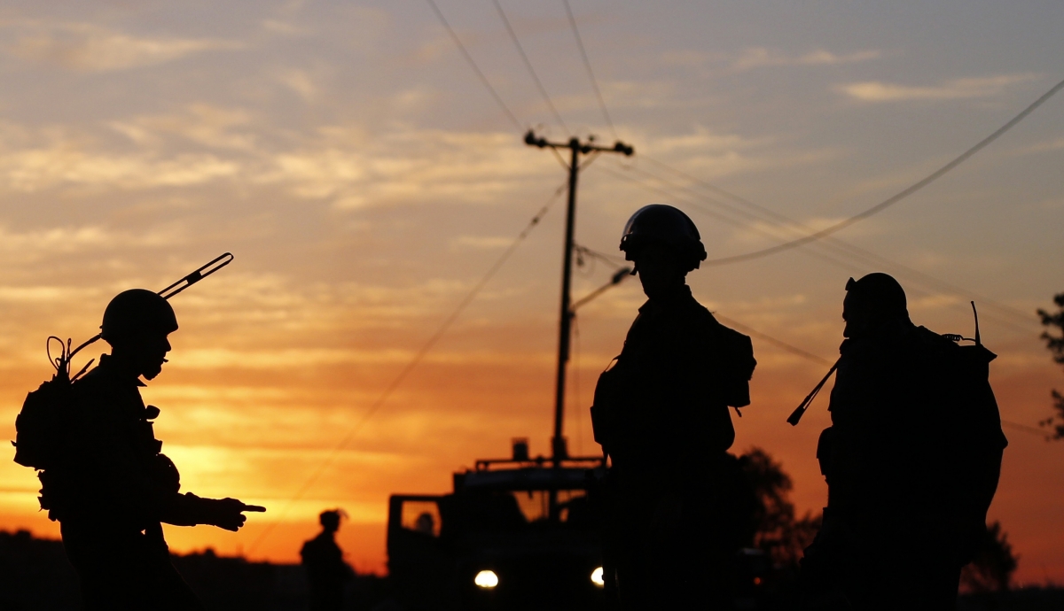 Israeli border police officers stand guard during clashes with Palestinian protesters against the Jewish settlement of Ofra, in the West Bank village of Silwad, near Ramallah Israel Palestine