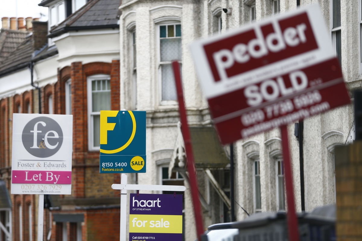 Britain's housing market shirks off banks trying to curb mortgage lending