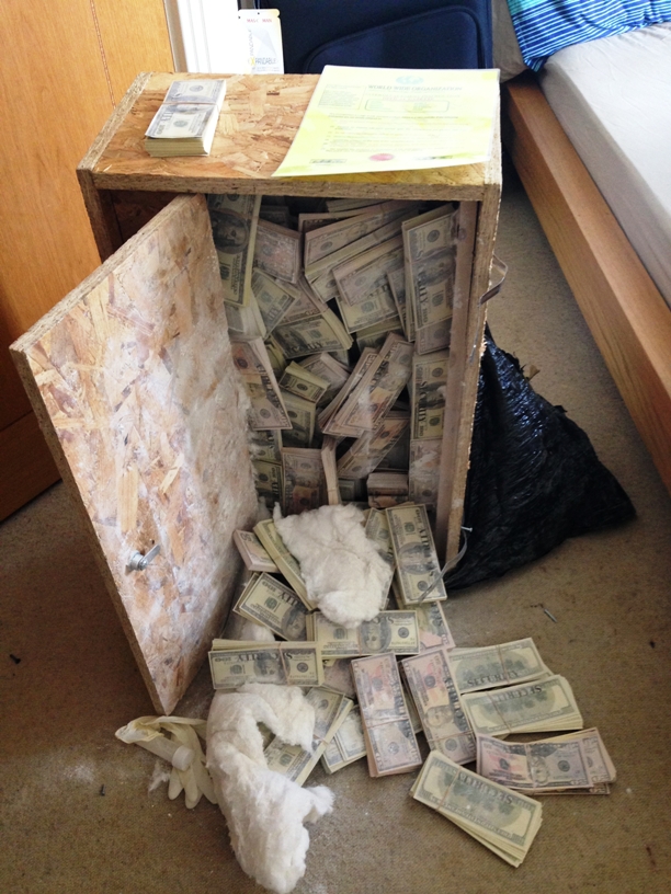 million found cash money london attic dollars police flat hidden were seize seized millions suspected crew cupboard much laundering scheme