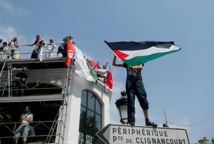 Parisians take part in a protest in support of Palestinians.