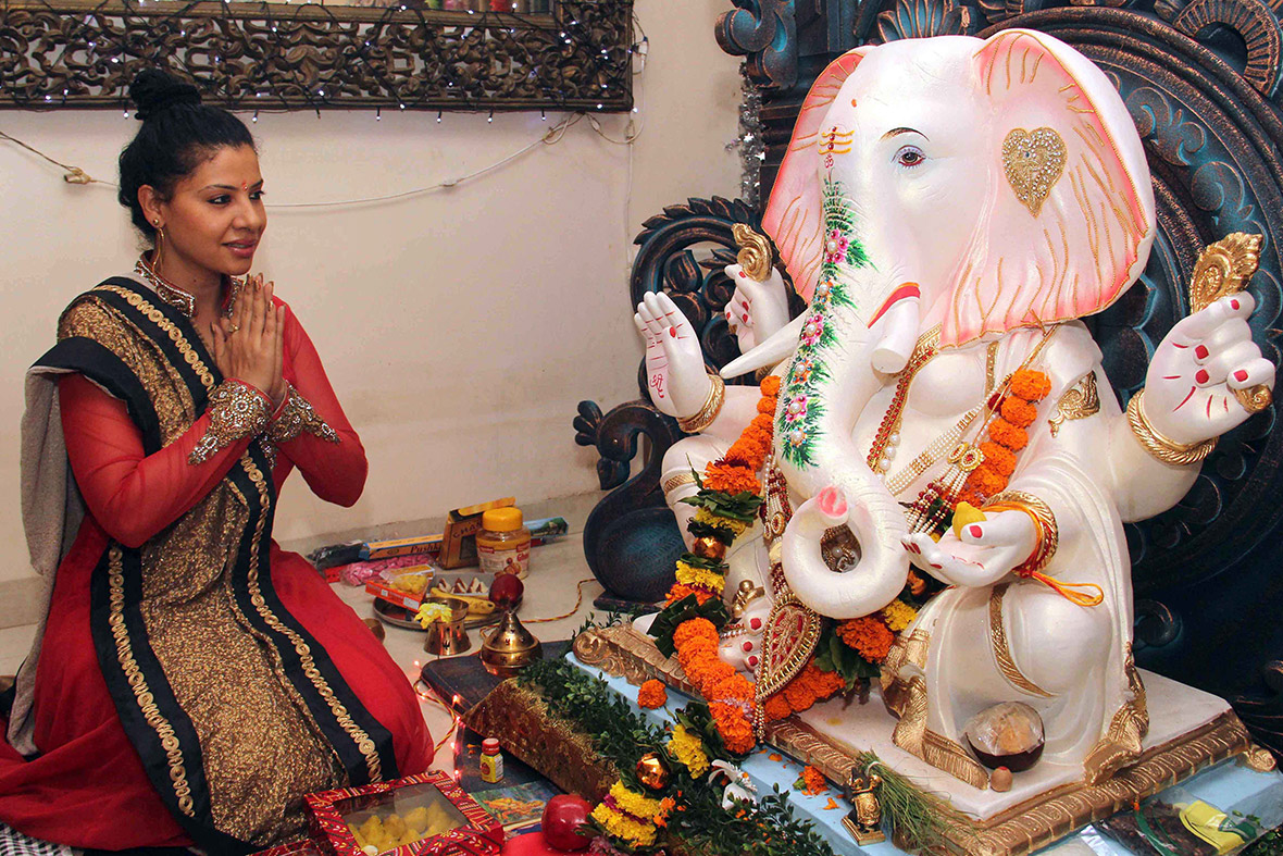 Bollywood actress Rani Mukherjee offers prayers in front of an idol of Hindu god Lord Ganesh in Mumbai