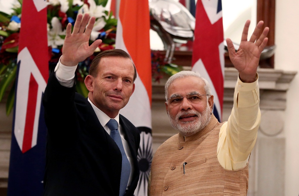 Australia's prime minister Tony Abbott and his Indian counterpart Narendra Modi after a signing agreements in New Delhi. Australia and India Seal Civil Nuclear Deal