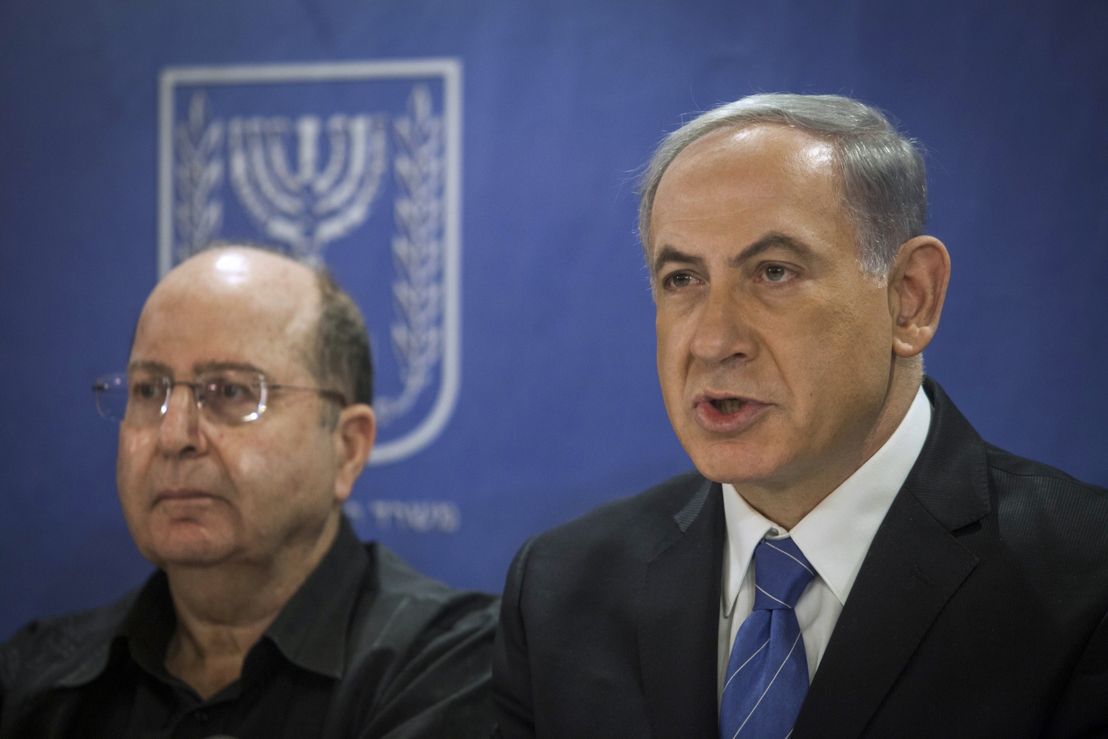 Israel's Prime Minister Benjamin Netanyahu and Defence Minister Moshe Yaalon attend a cabinet meeting in Tel Aviv. Israel Gaza