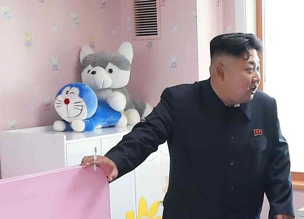 Two soft toys appearing to strike sex pose behind Kim Jong-un have amused the web