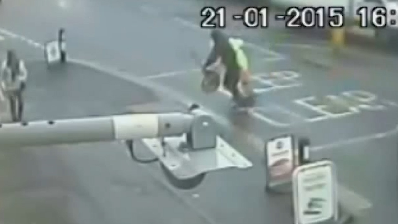 Shocking video shows lollipop man assaulted and robbed of his stick