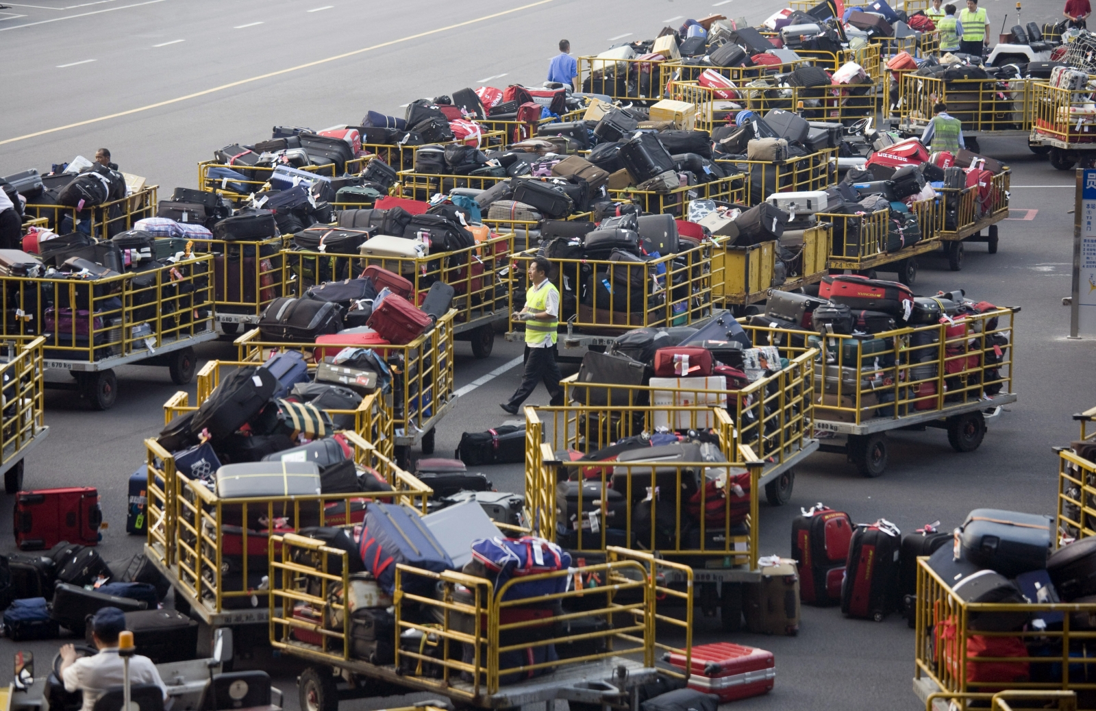 Miami airport baggage handlers filmed stealing from plane passengers
