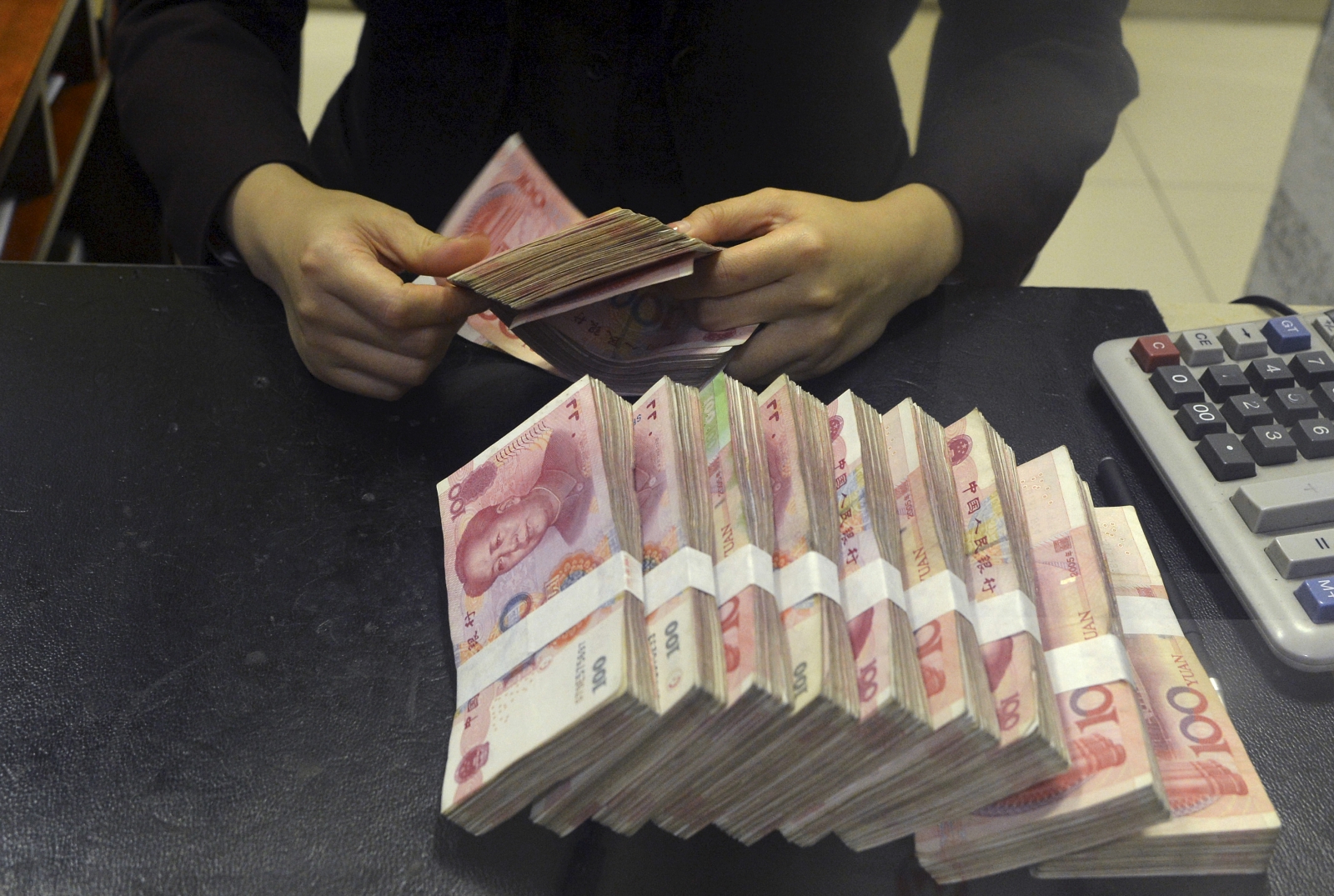 City of London gets boost after China's central bank launches first yuan-denominated bonds Yuan-banknotes