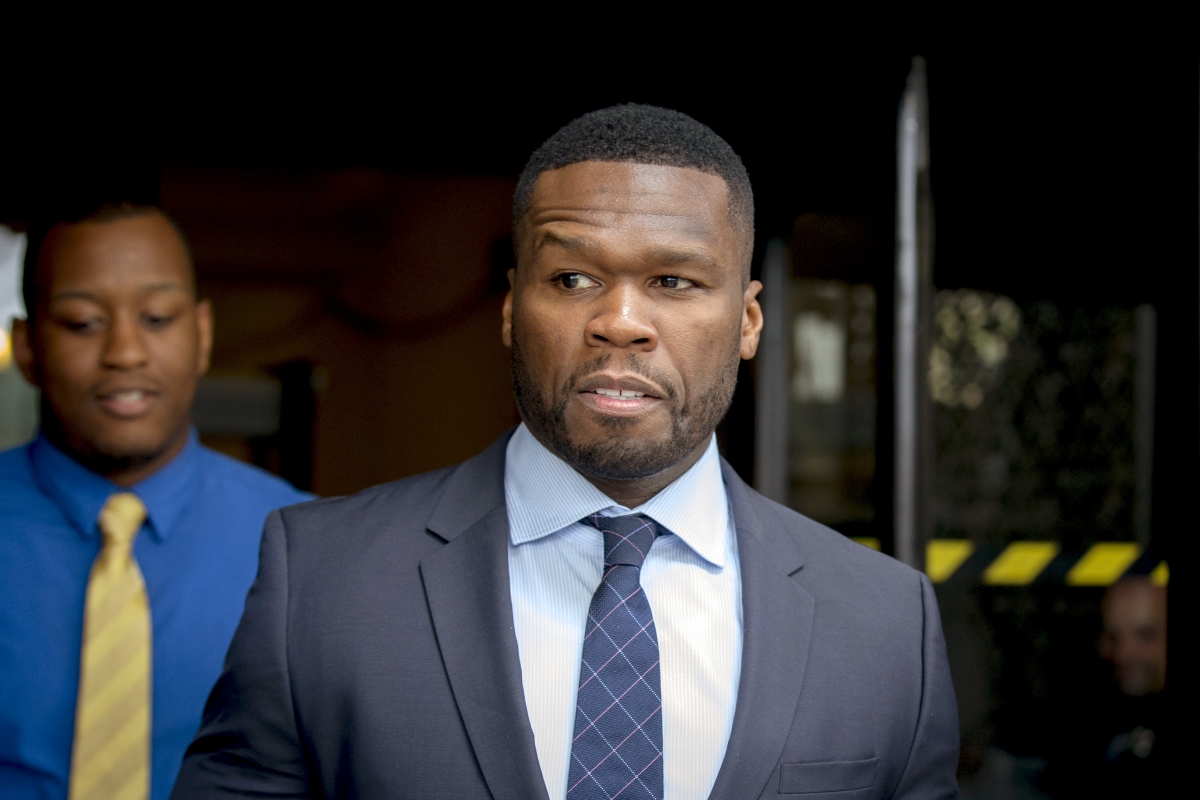 50 Cent net worth Rapper poses with 100 bills on Instagram in
