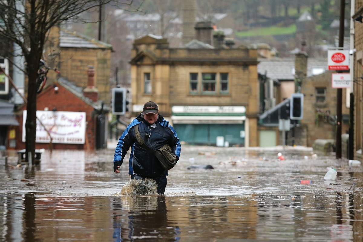 UK floods: Police and bikers join forces to protect homes from looters in West Yorkshire Hebden-bridge