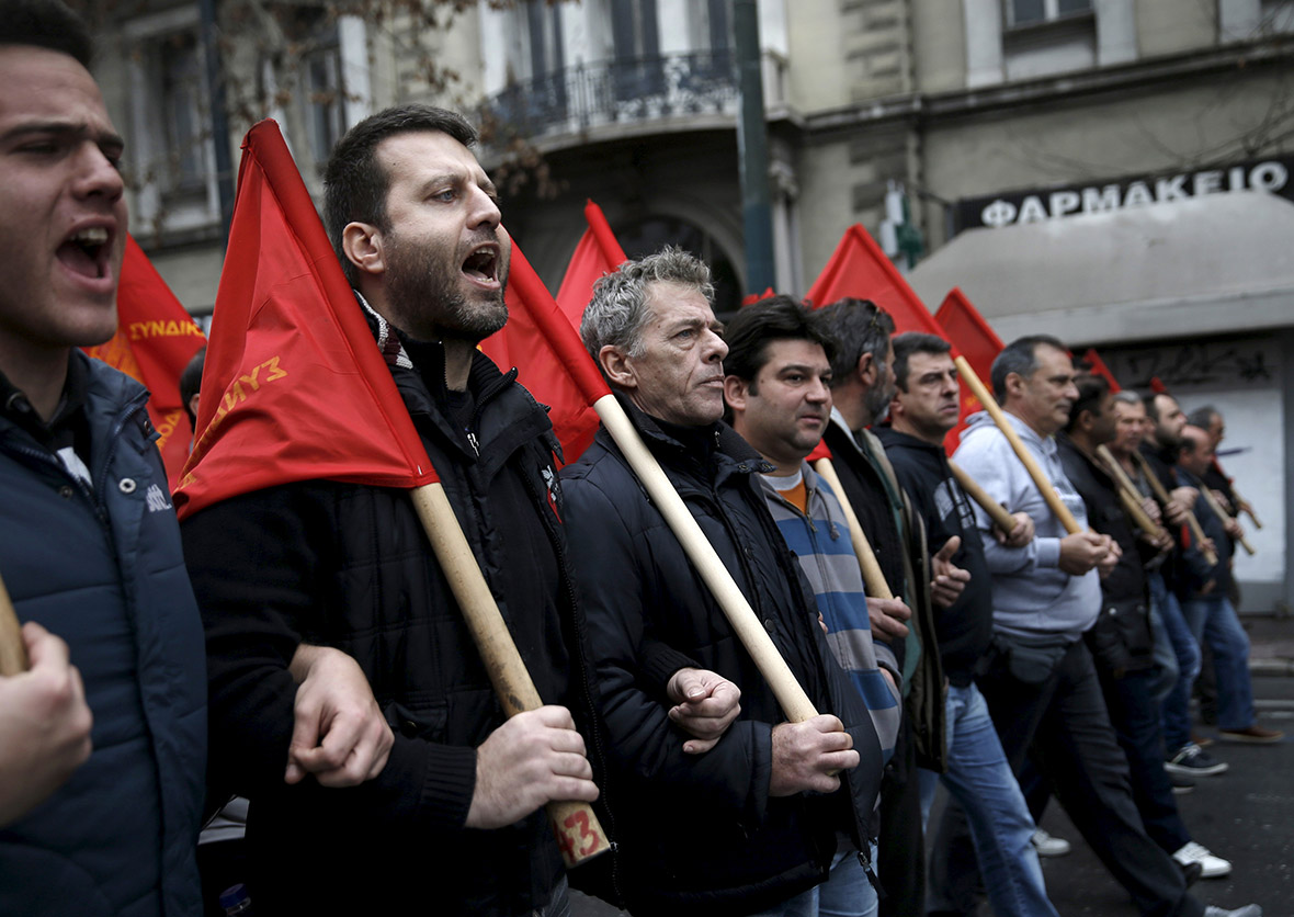Greece strike Protesters march in Athens, throwing petrol bombs and