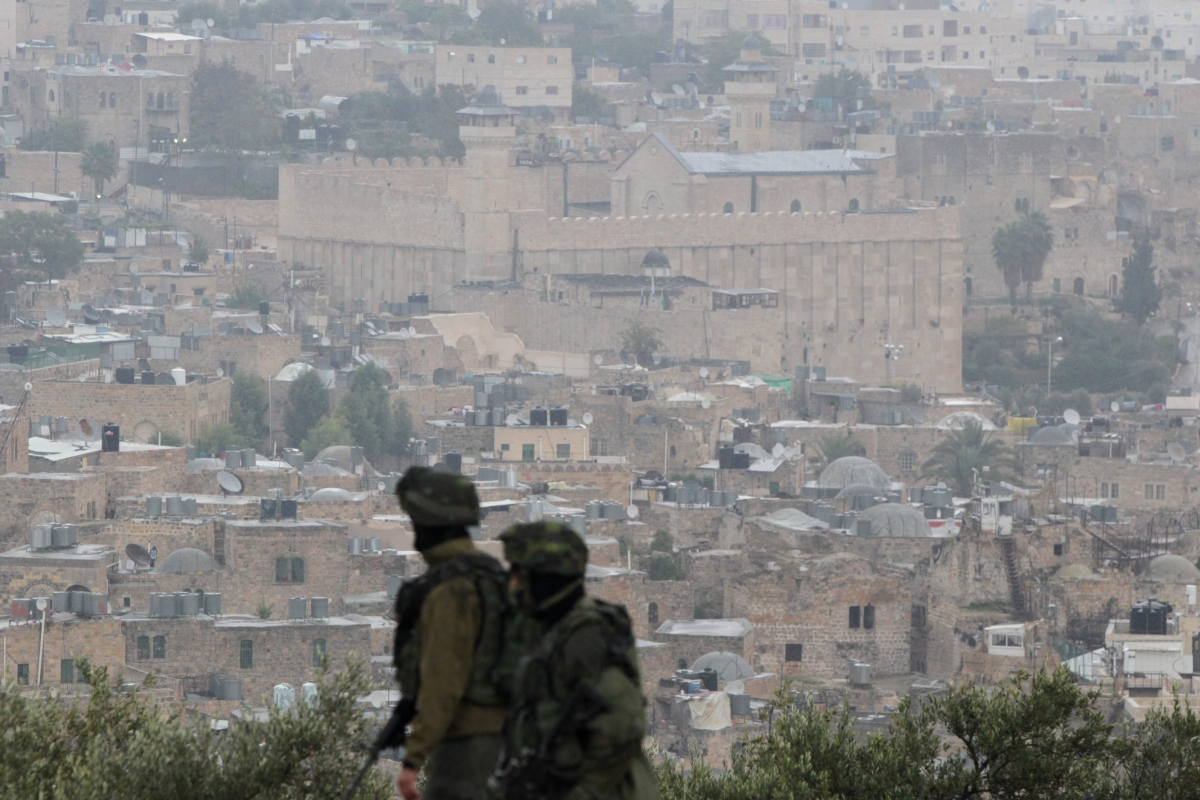 Anger mounts at Israeli soldier filmed throwing disabled Palestinian out of his wheelchair