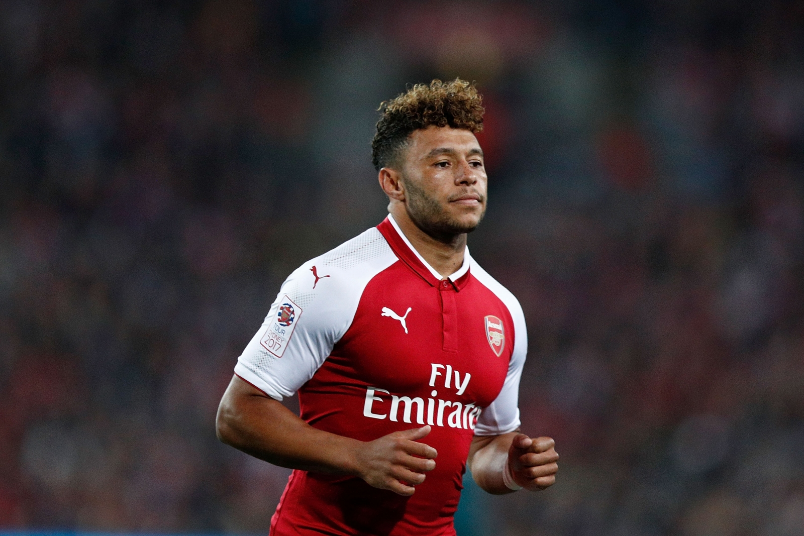 Arsene Wenger insists Alex Oxlade-Chamberlain will stay at Arsenal amid Liverpool interest
