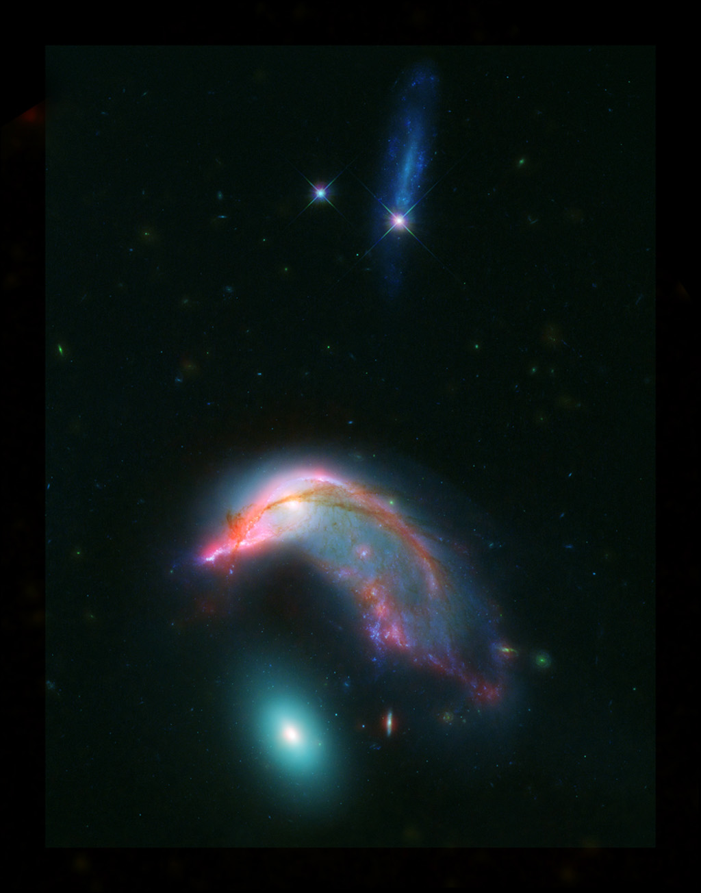 'Penguin Guarding Its Egg': Hubble Captures Distant Colliding Galaxies ...