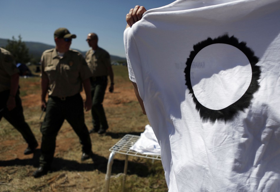 Shirts depicting an eclipse are sold by vendors before a rare annular eclipse dims the sky, in the southwestern town of Kanarraville, Utah, May 20, 2012. The sun and moon will align over the earth in a rare astronomical event on Sunday - an annular eclipse that will dim the skies over parts of Asia and North America, briefly turning the sun into a blazing ring of fire. Eclipses of some type occur almost every year, but stargazers have not seen an annular - shaped like a ring - eclipse on U.S. soil since 1994, and the next one is not to occur until 2023.