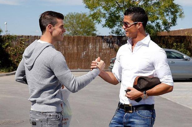 gareth-bale-christiano-ronaldo-greet-each-other-real-madrid-car-park-pic-real-madrid.jpg