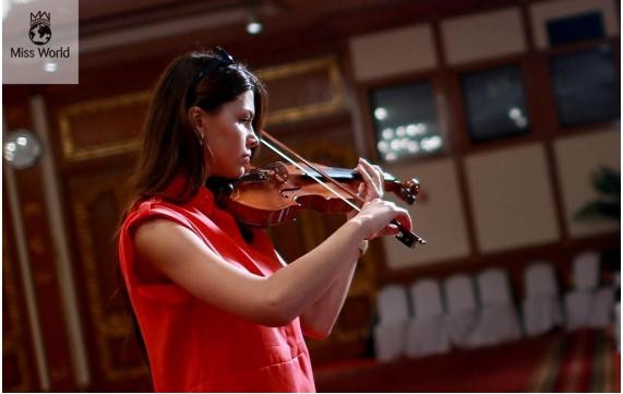 Miss Slovakia will perform a piece with her violin (Miss World Organisation) Miss Slovakia will perform a piece with her violin/Missworld.com