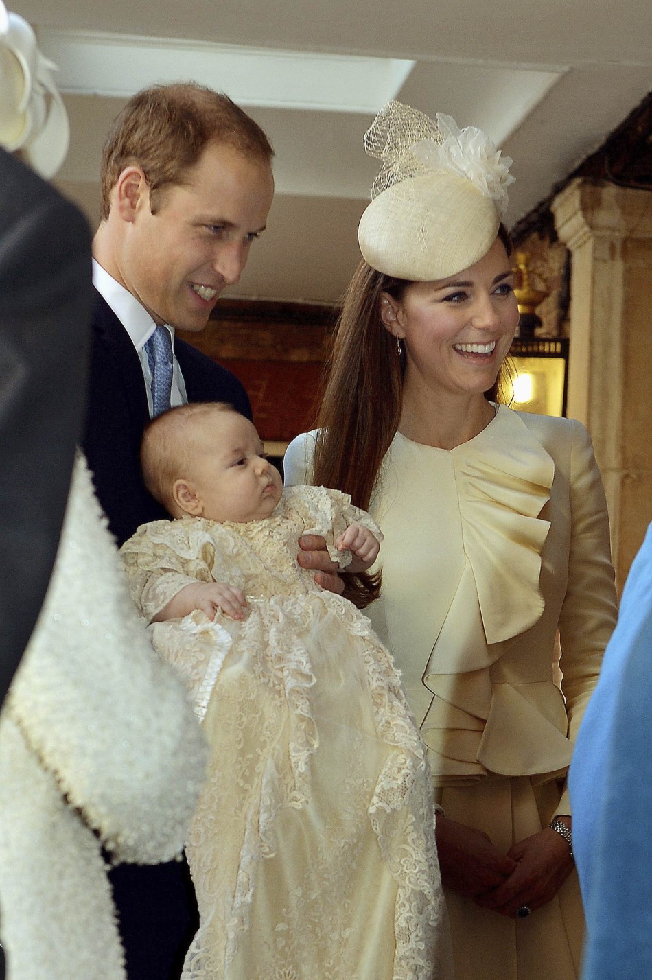 William carries Prince George, as he arrives with his wife Catherine, Duchess of Cambridge for their son's christening at St James's Palace in London 23 October 2013. REUTERS Britain's Prince William carries his son Prince George, as he arrives with his wife Catherine, Duchess of Cambridge for their son's christening at St James's Palace in London