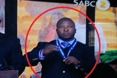 Criminal record? Thamsanqa Jantjie on the podium at the Mandela memorial service