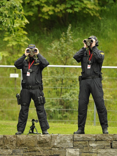 Armed security guards guard the Irish War Memorial Gardens during a visit by the Queen and Ireland039s President Mary McAleese. Armed security guards guard the Irish War Memorial Gardens during a visit by the Queen and Ireland039s President Mary McAleese.