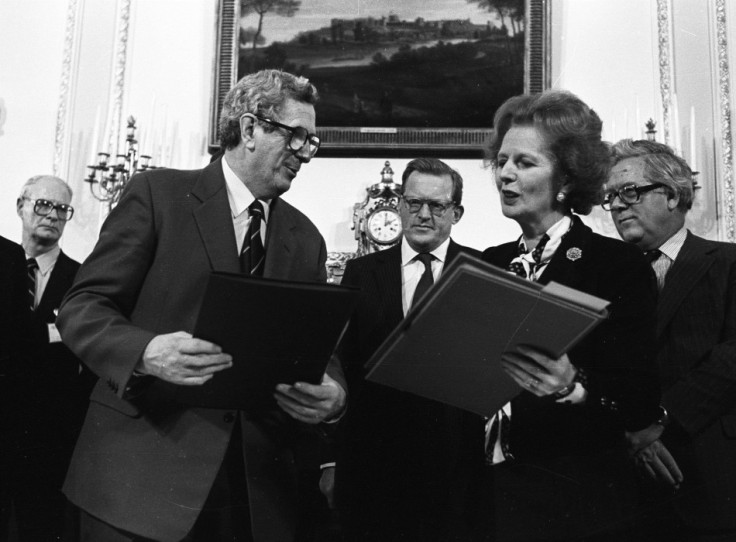 Irish PM Fitzgerald and British PM Thatcher exchange documents after signing Anglo-Irish agreement at Hillsborough House on November 15, 1985