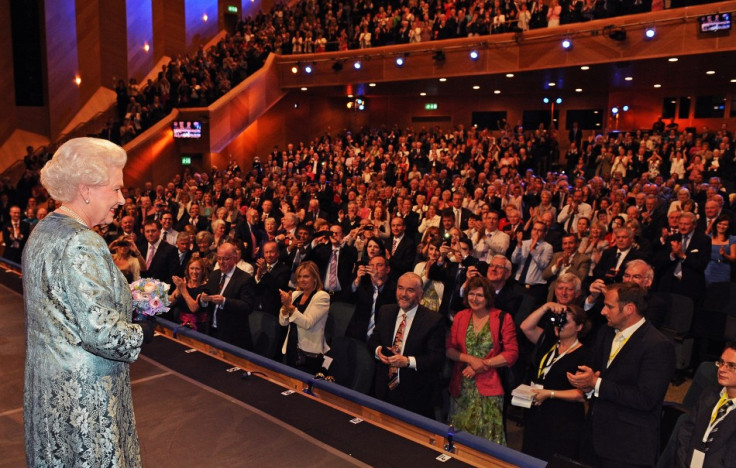 Queen Elizabeth faces the applauding audience at the Convention Centre in Dublin