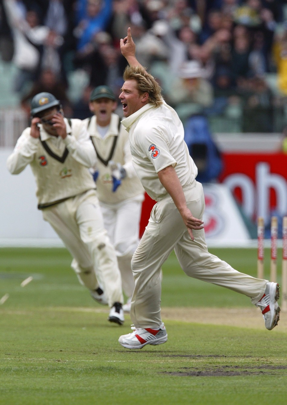 Warne wheels away becoming the first bowler to reach 700 wickets during the first day of the fourth Ashes cricket test between Australia and England at the Melbourne Cricket Ground December 26, 2006.