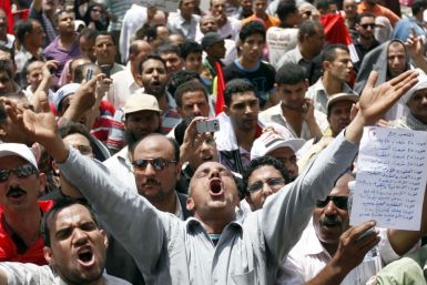 A man gestures during a demonstration in Tahrir Square in Cairo