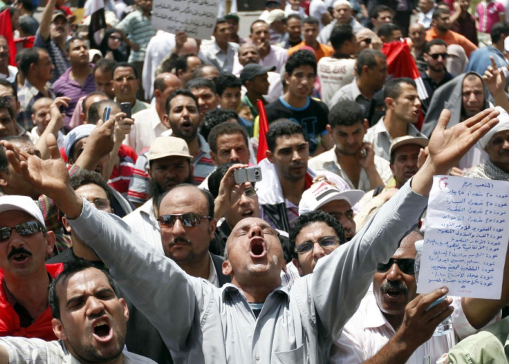 A man gestures during a demonstration in Tahrir Square in Cairo