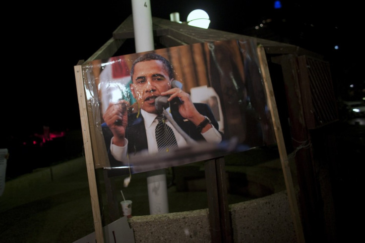 A poster of U.S. President Obama is seen after eggs were thrown at it during an Israeli right wing protest in Tel Aviv