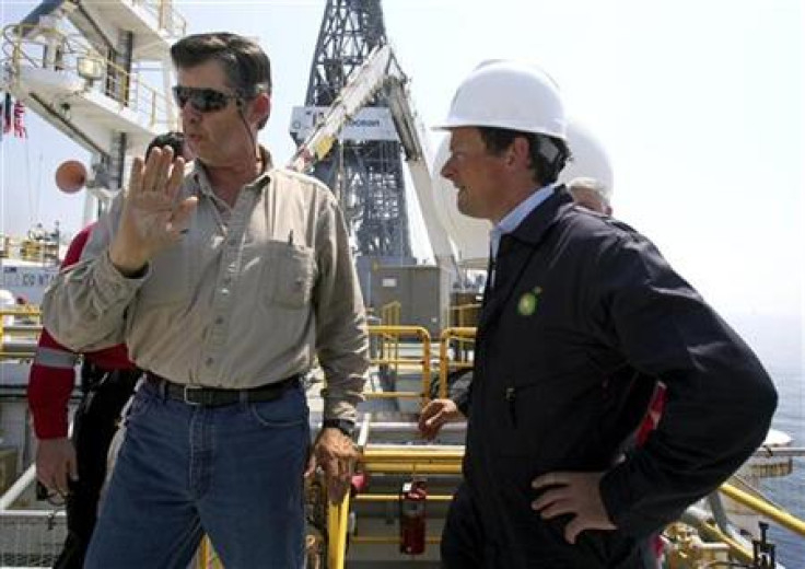 BP Wellsite leader Walker meets BP CEO Hayward aboard the Discover Enterprise drill ship in the Gulf of Mexico