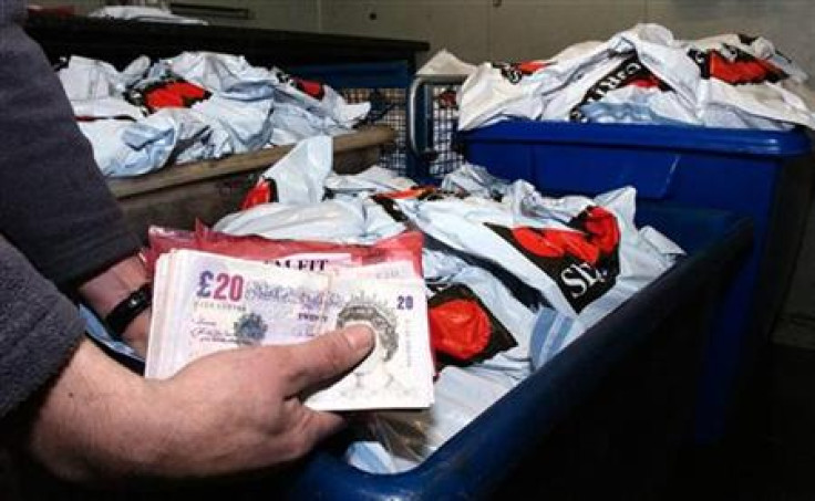 Undated handout photo released by Kent Police shows some of the cash recovered from the robbery of a Securitas depot in Tonbridge Undated handout photo released by Kent Police shows some of the cash recovered from the robbery of a Securitas depot in Tonbridge