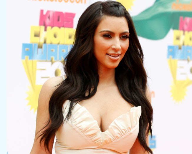 Television personality Kim Kardashian poses at the 2011 Nickelodeon Kids Choice Awards in Los Angeles, California April 2, 2011