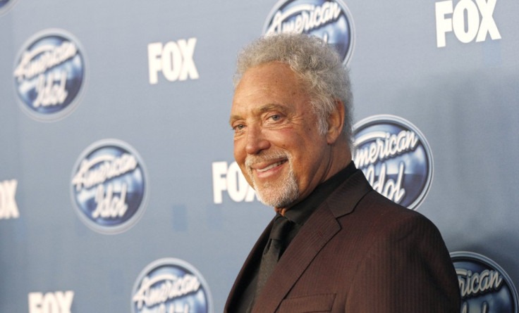 Singer Tom Jones poses backstage at the finale of the 10th season of &quot;American Idol&quot; in Los Angeles May 25, 2011.