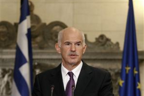 Greece's PM Papandreou addresses reporters during a news briefing at the Maximos mansion in Athens