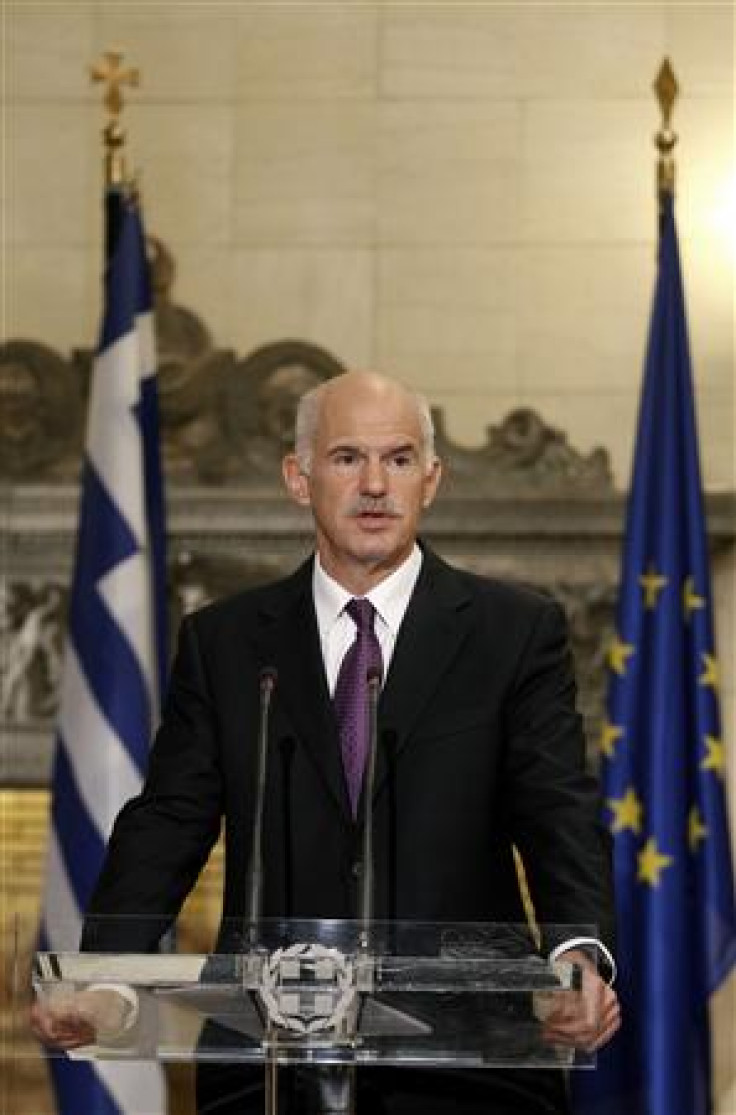 Greece's PM Papandreou addresses reporters during a news briefing at the Maximos mansion in Athens