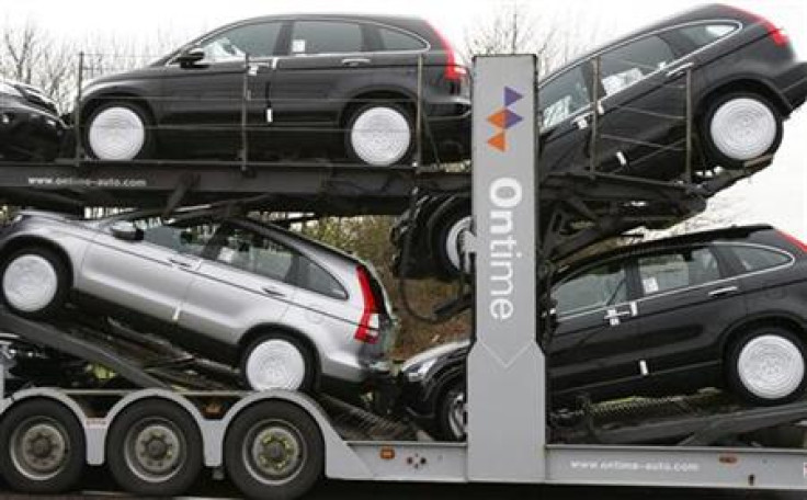 A new car transporter leaves the Honda manufacturing plant in Swindon