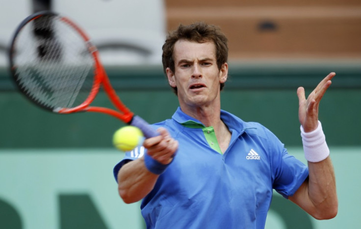 Andy Murray of Britain returns the ball to Viktor Troicki of Serbia during the French Open tennis tournament at the Roland Garros stadium in Paris