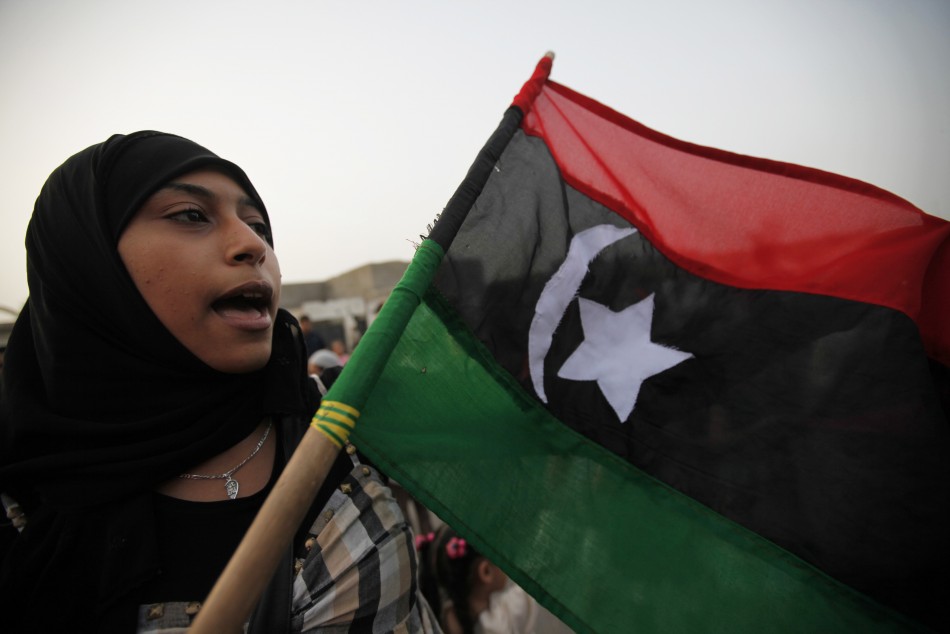 a women chant a slogan during a small demonstration against Libyan Leader Muammar Gaddafi