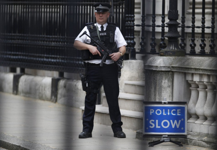 A man is holed up in a bank in Watford with a bomb strapped to his leg