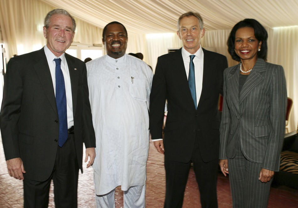 Former U.S. President Bush, Chairman of THISDAY Newspapers Obaigbena, Britains former PM Blair and former U.S. Secretary of State Rice pose for photograph in Abuja