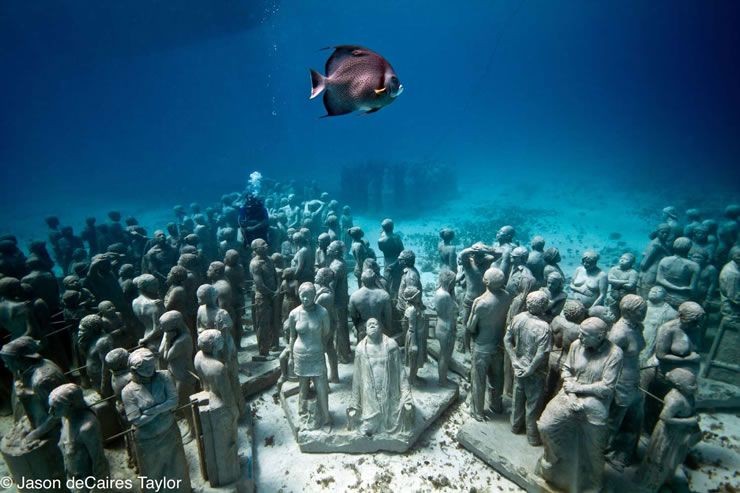 Underwater human reef saves natural reef