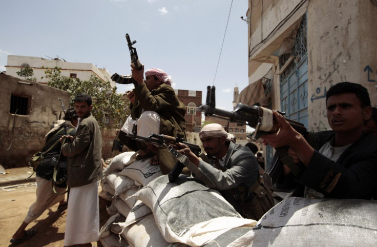 Tribesmen loyal to tribal leader Sadeq al-Ahmar secure a street near al-Ahmar&#039;s house in Sanaa
