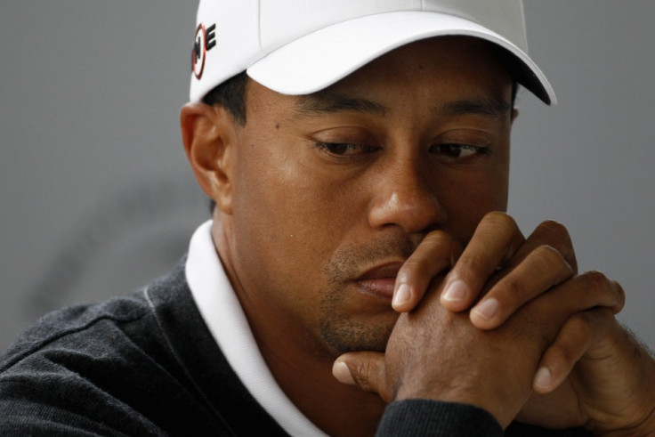 Golfer Tiger Woods of the U.S. attends a news conference of the upcoming HSBC golf tournament in Shanghai November 3, 2010.